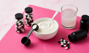Collagen supplement powder, capsules, and dissolved collagen drink arranged on a teal surface representing the 2026 collagen study findings