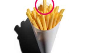 Golden french fries highlighted with a pink ring graphic representing the Harvard BMJ study on french fries and type 2 diabetes risk