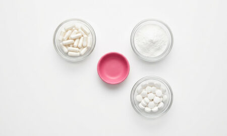 Magnesium supplement capsules and powder arranged for a 2026 sleep and anxiety guide